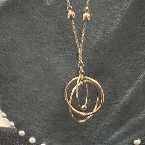 Nina Ricci Gold-Tone Interlocking Circle Pendant Necklace